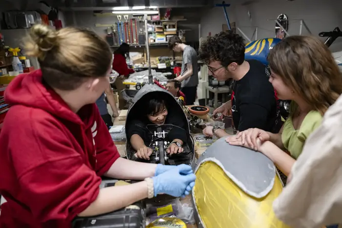 Team Apex at work on buggies. 