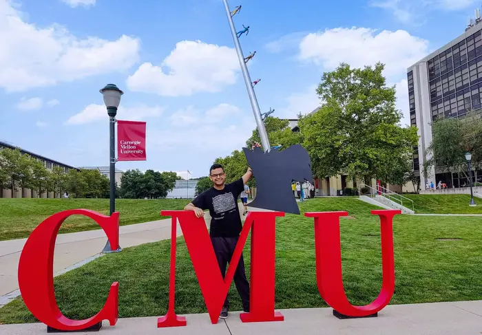 Vera with large CMU letters.