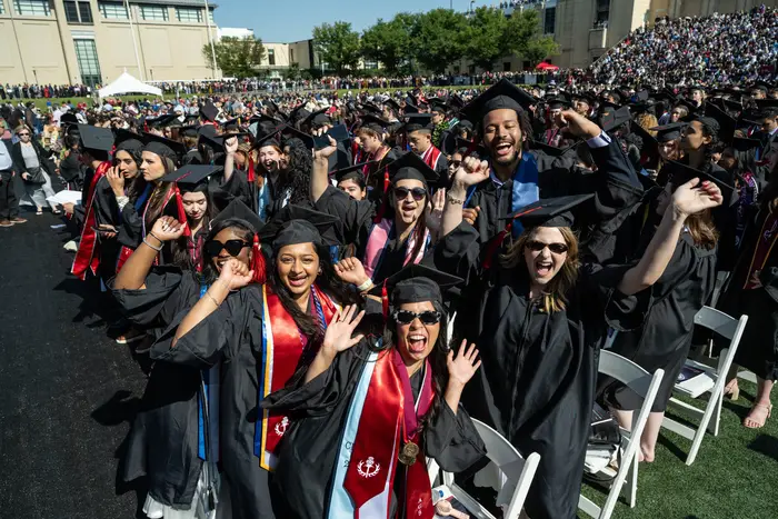 CMU graduates celebrate at Commencement.