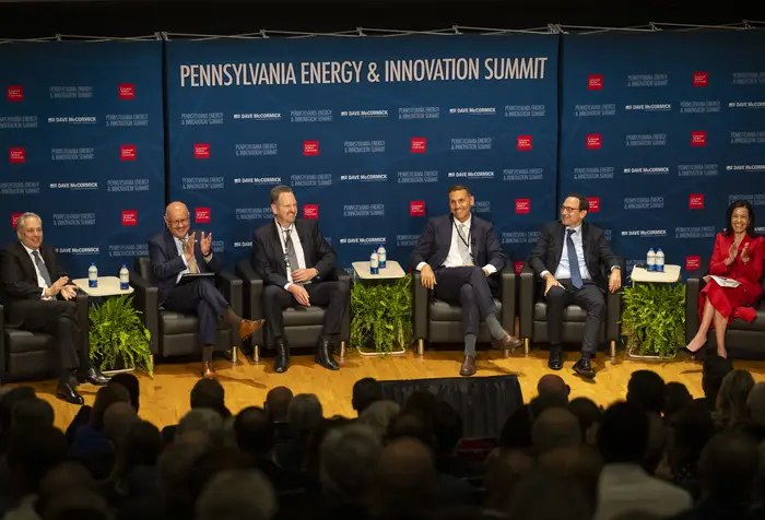 Farnam Jahanian sits on a panel.