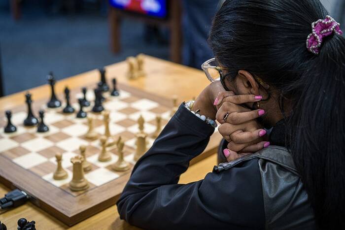 Ashritha Eswaran at a chess board