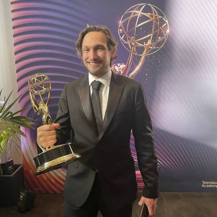 Noah Mitz with an Emmy