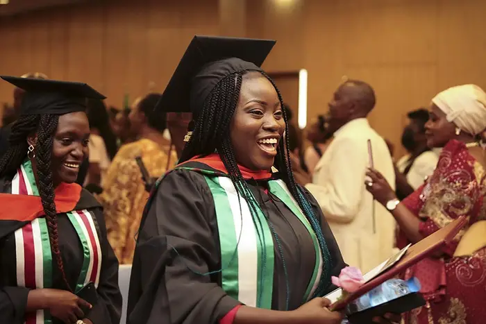 A student in a graduation cap and gown