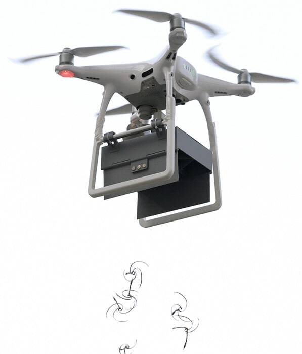 A drone drops E-seeds
