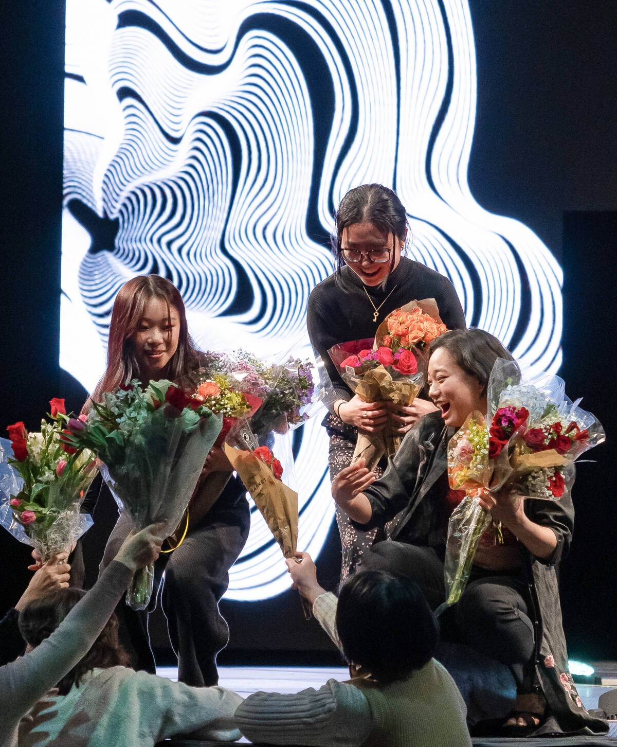 Flowers are gifted to Lunar Gala designers.