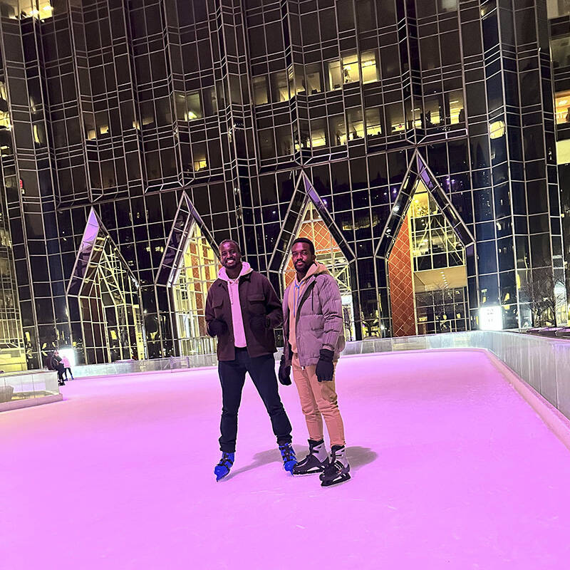 Students from CMU-Africa ice skate at PPG Place in downtown Pittsburgh.