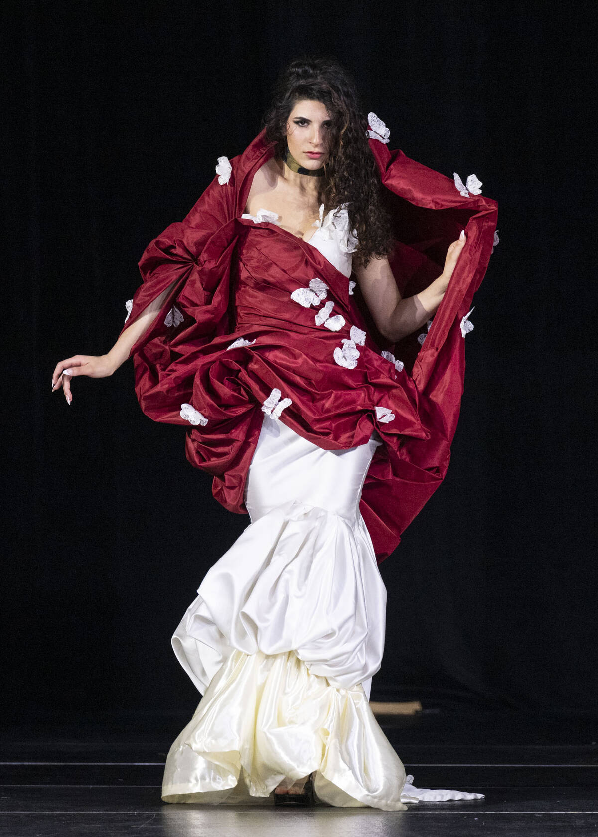 Lunar gala model wearing red and white dress with shoulder accents