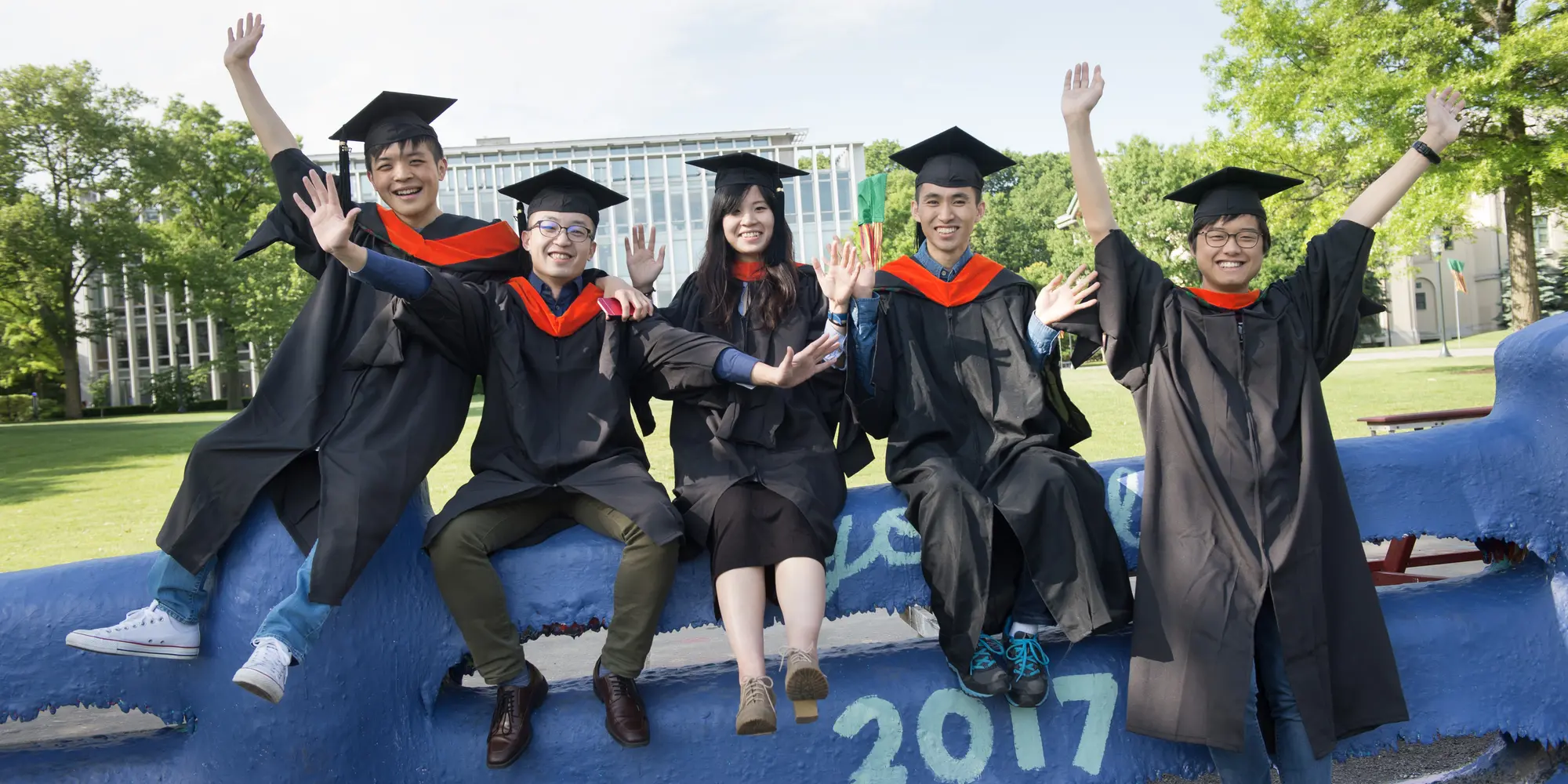 Graduates at the Fence.