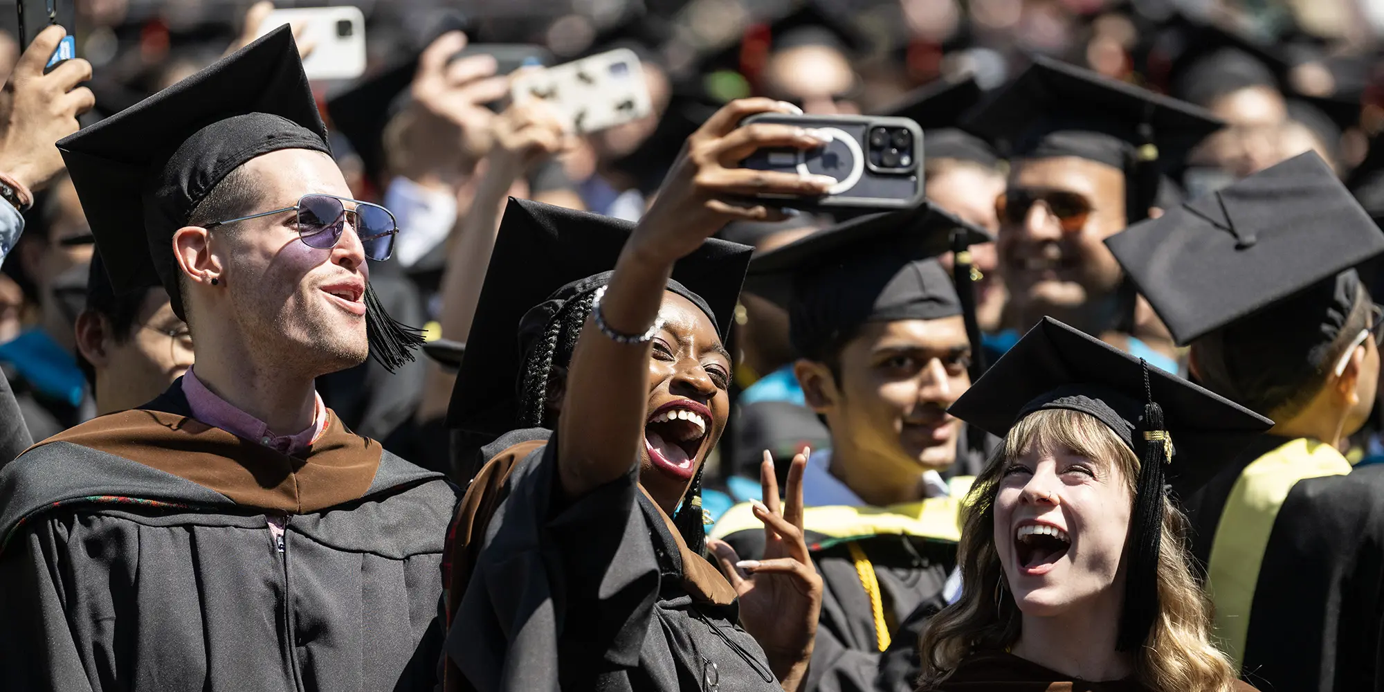 Graduating students celebrate at Commencement.