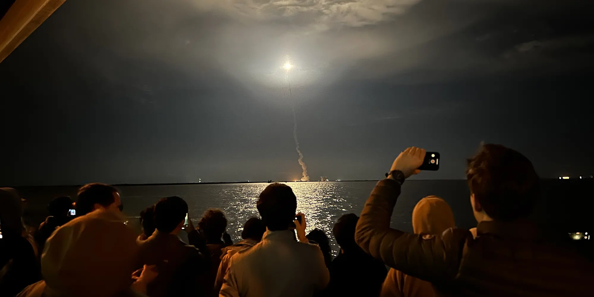 The Iris team watched the rocket lift off.