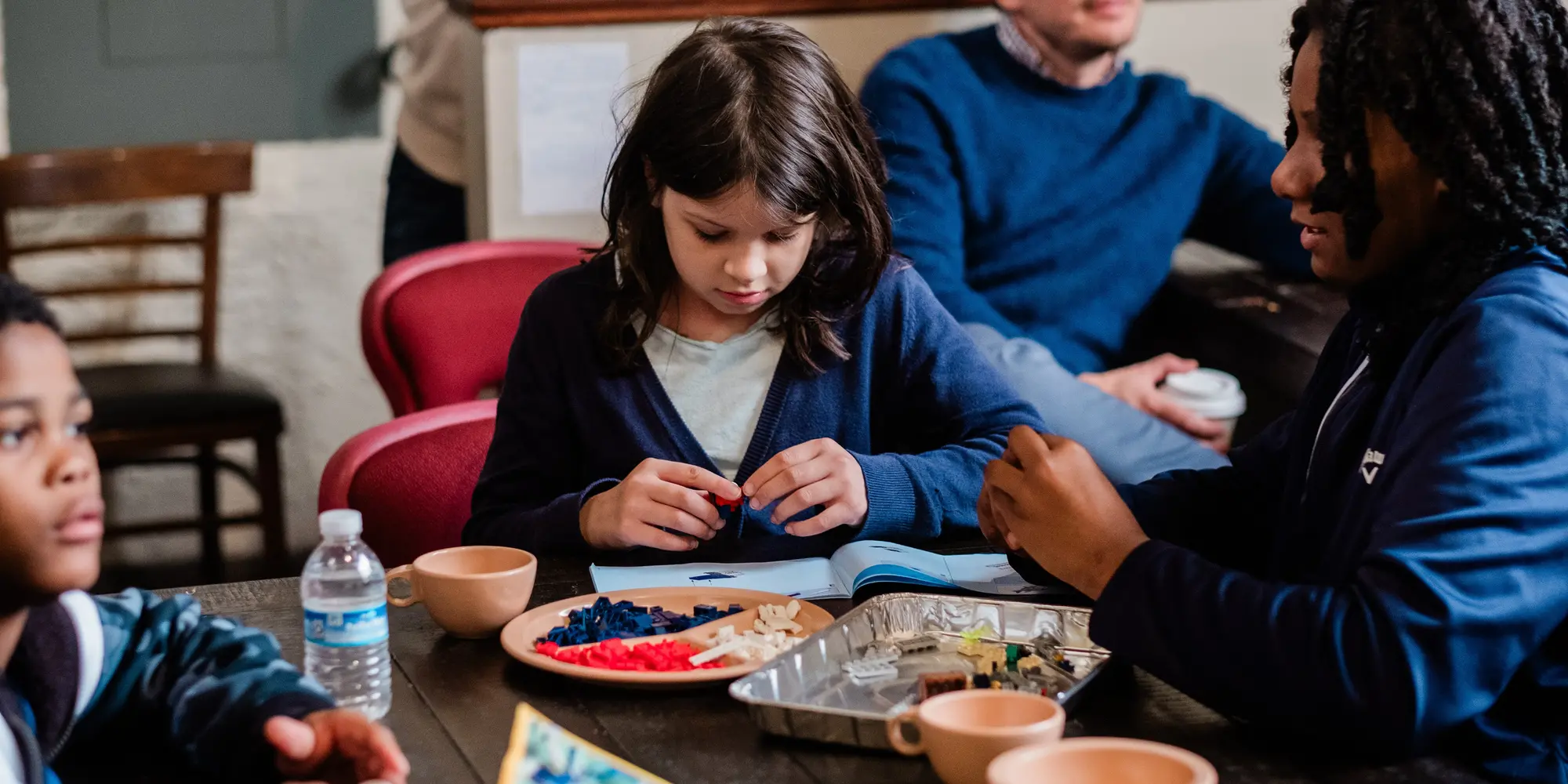 Students using LEGOs.