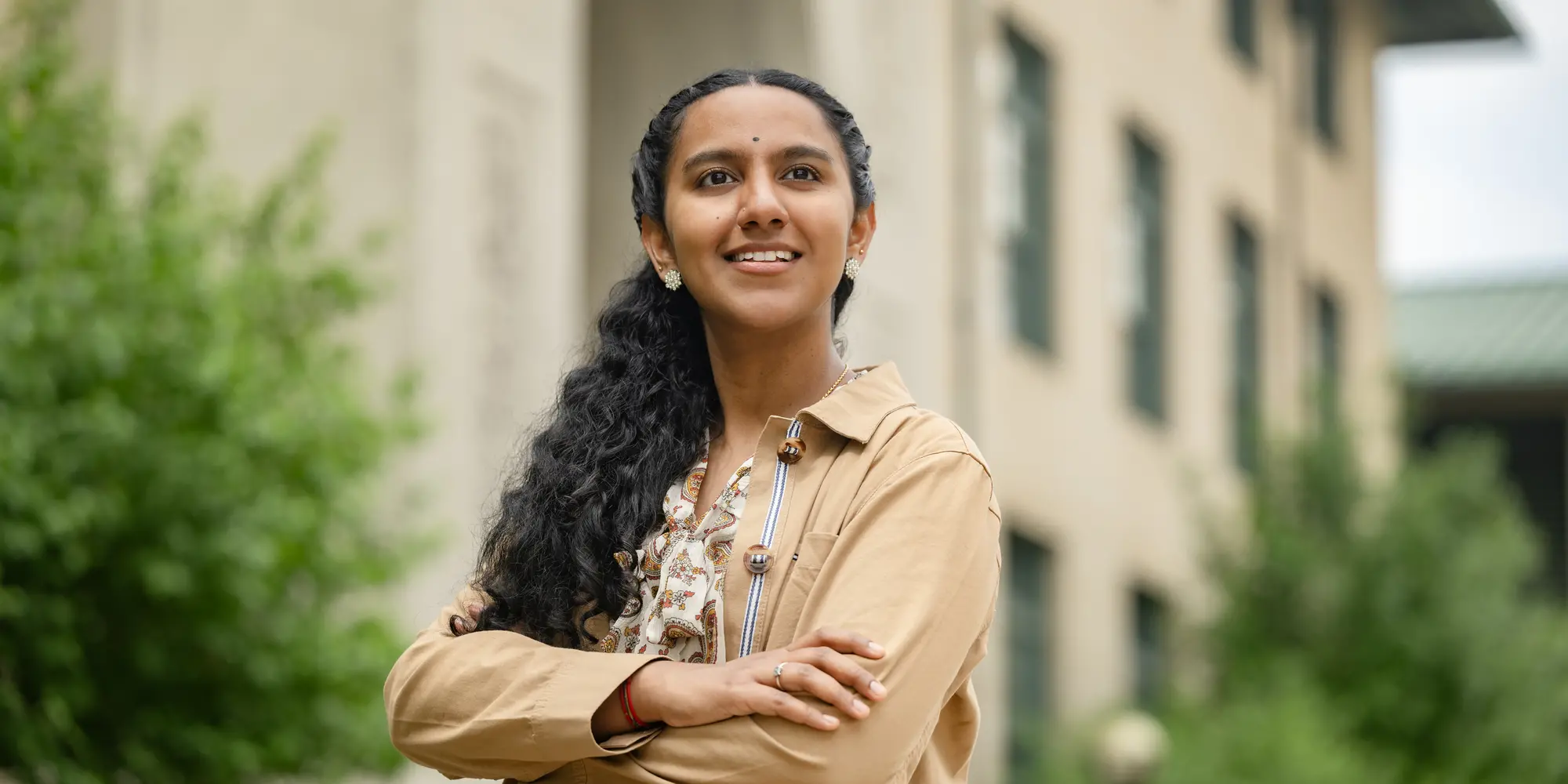 Prasiddha Sudhakar standing outside of Hamburg Hall.