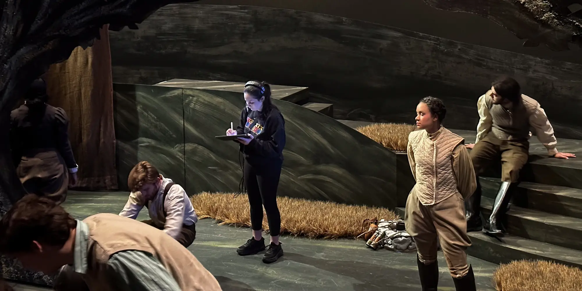 Liberty Lapayowker (center) acting as assistant stage manager for a production of “You on the Moors Now” during her sophomore year.