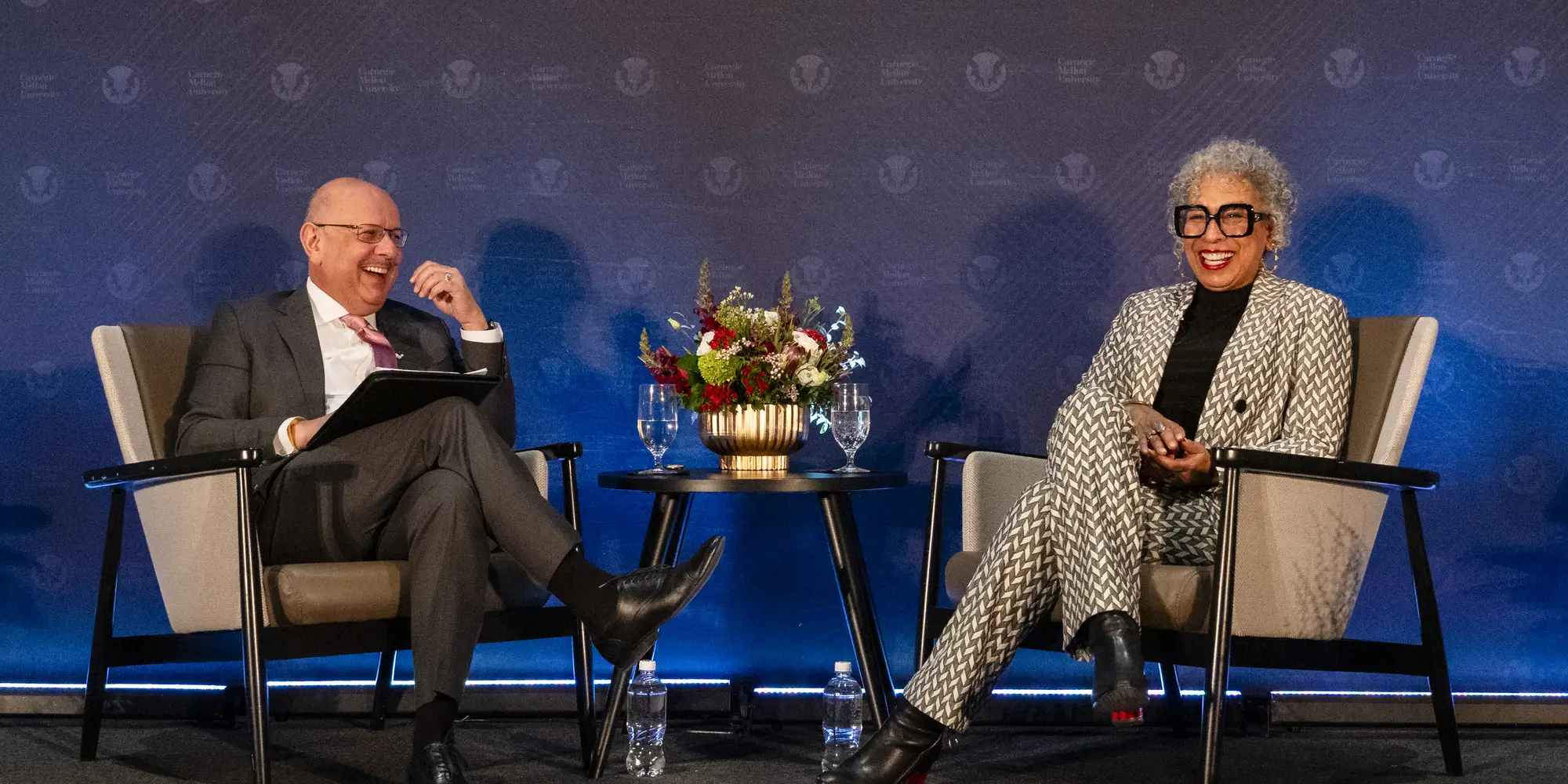 Farnam Jahanian and Tamara Tunie seated on stage