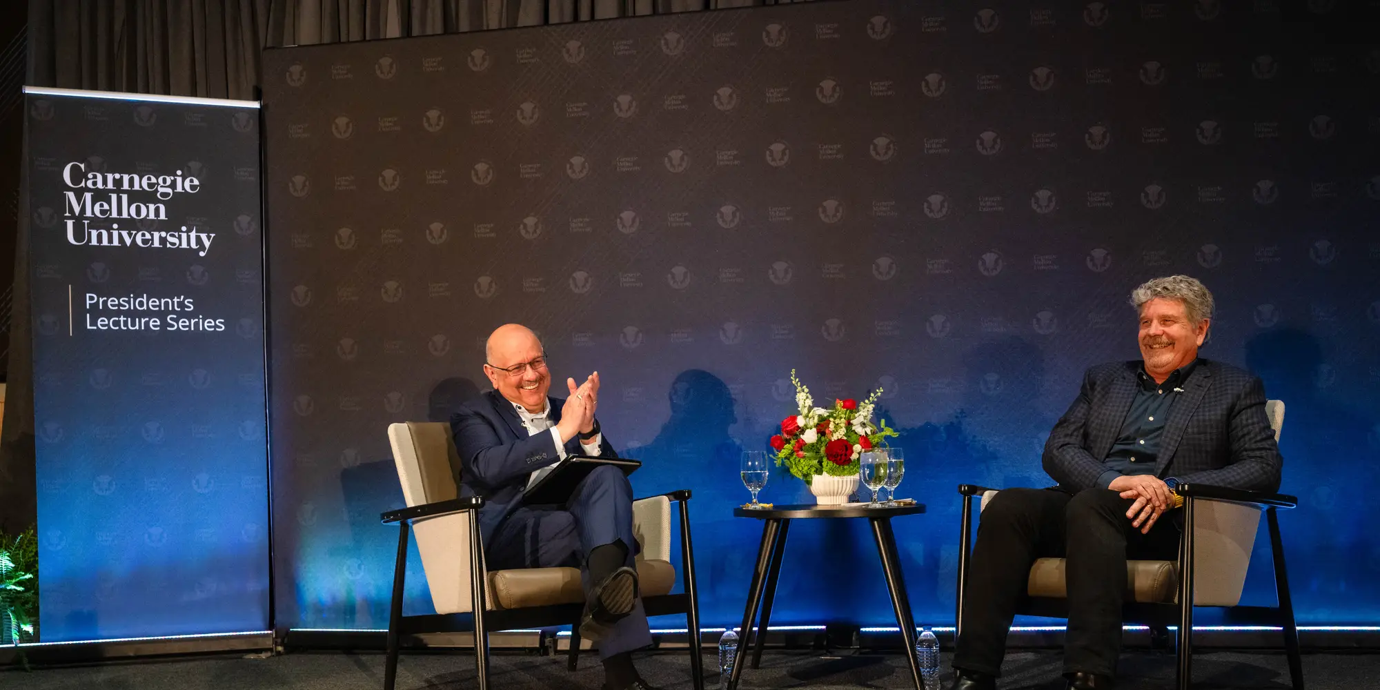 Farnam Jahanian speaks with John Wells at the Presidents Lecture Serires.