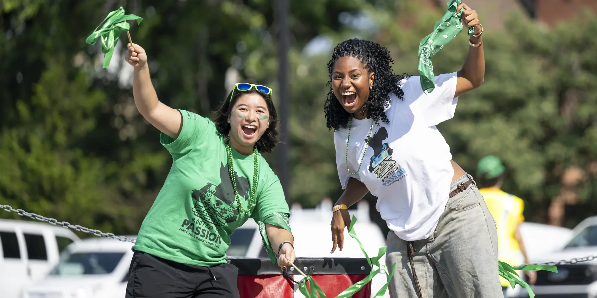 Orientation counselors and volunteers wait to help students move their belongings to their rooms.