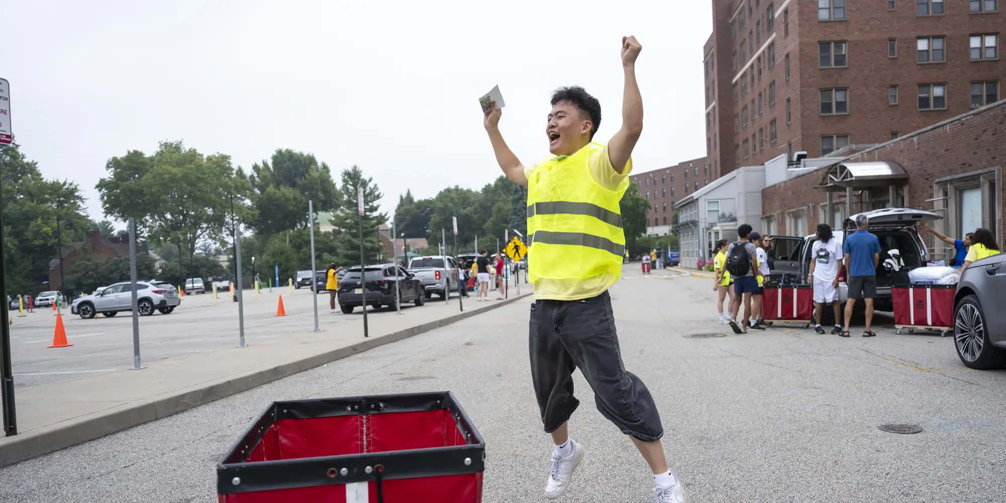 A new student jumps for joy. 