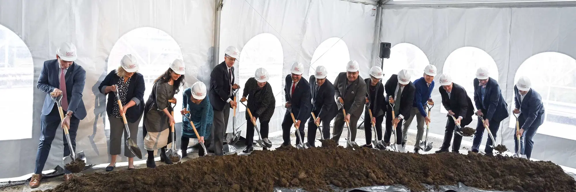 Shovels hit the dirt at the groundbreaking for the Richard King Mellon Hall of Sciences.