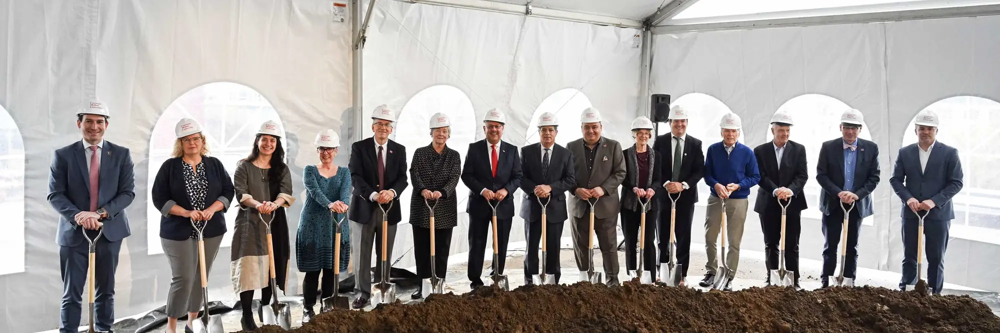 Shovels hit the dirt at the groundbreaking for the Richard King Mellon Hall of Sciences.