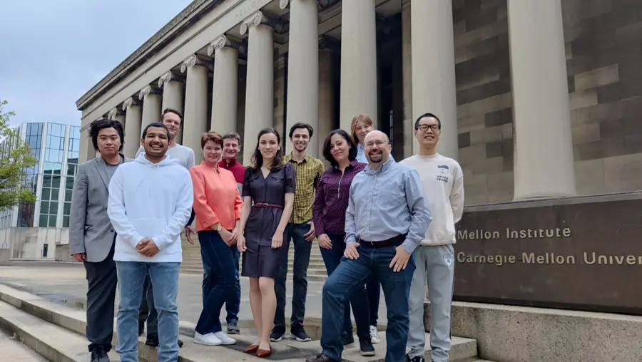 Chemistry Associate Professory Olexandr Isayev (second from right) and his research group