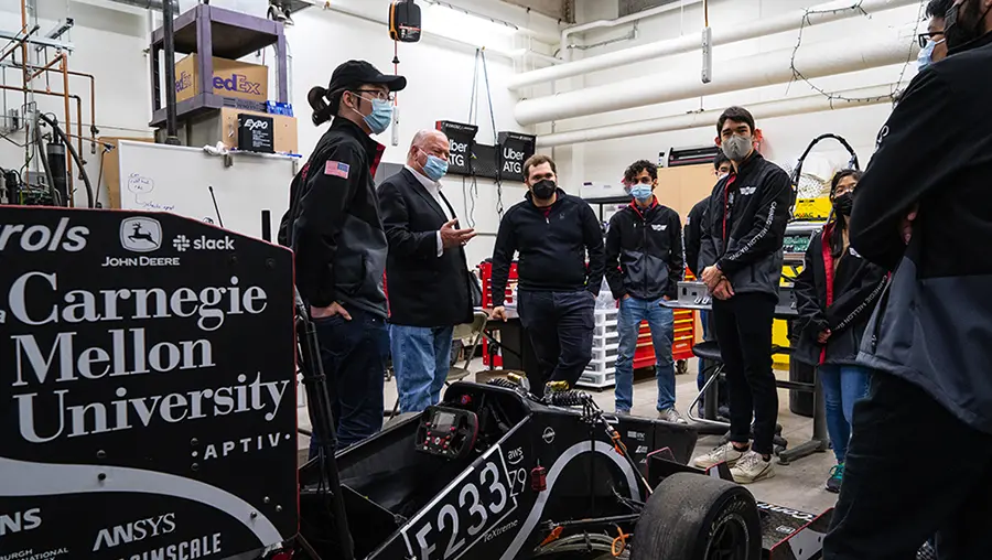 Chip Ganassi talks with students