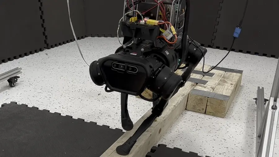 four-legged robot balancing on a beam