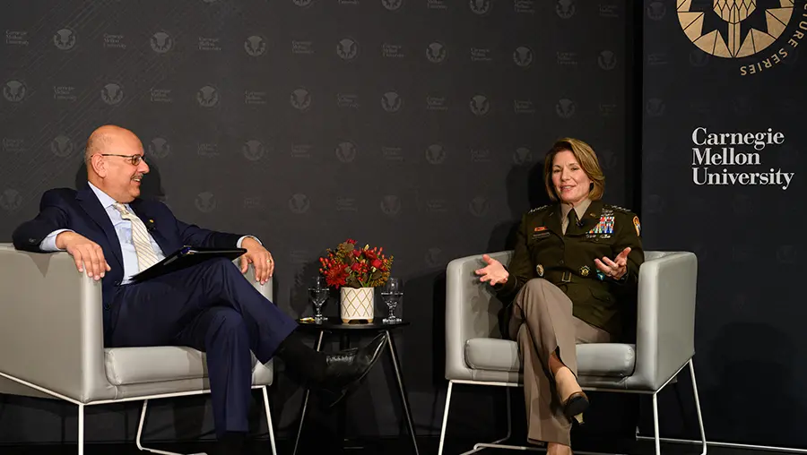 President Jahanian and General Richardson seated on stage