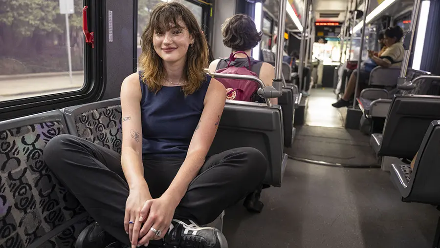 girl seated on bus