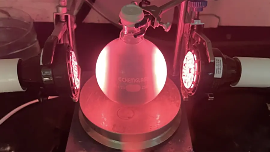 beaker shown under red light 
