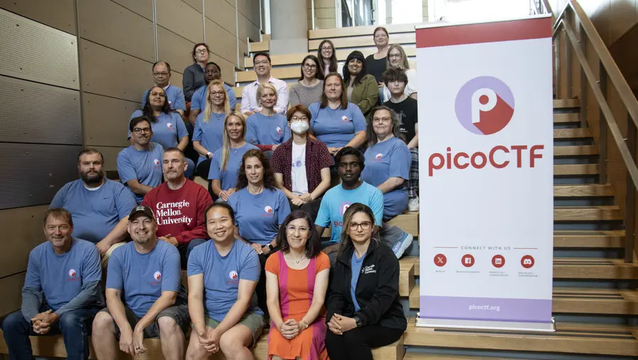 A group photo showing the 2024 GenCyber bootcamp cohort and members of CMU's CyLab.