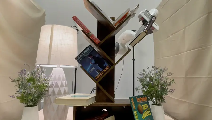Books on a tilted shelf