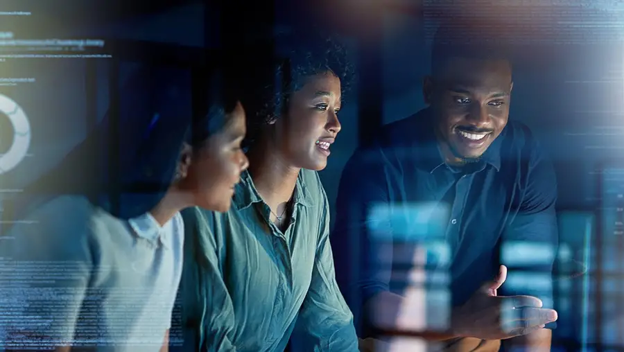 A stock image of people talking about technology