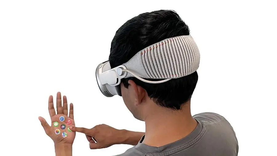 An illustration of a person with VR googles looking at icons on the palm of their hand. 