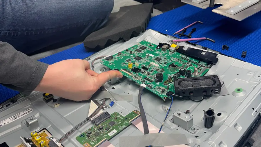 E-waste being examined.