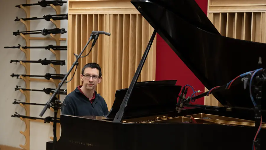 Evan O'Dorney plays piano.