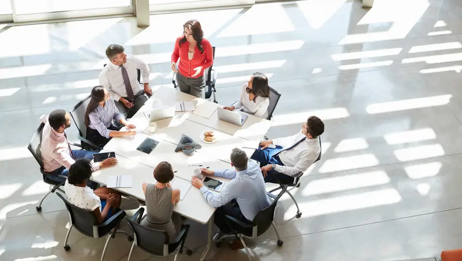 Businesspeople sitting around a table