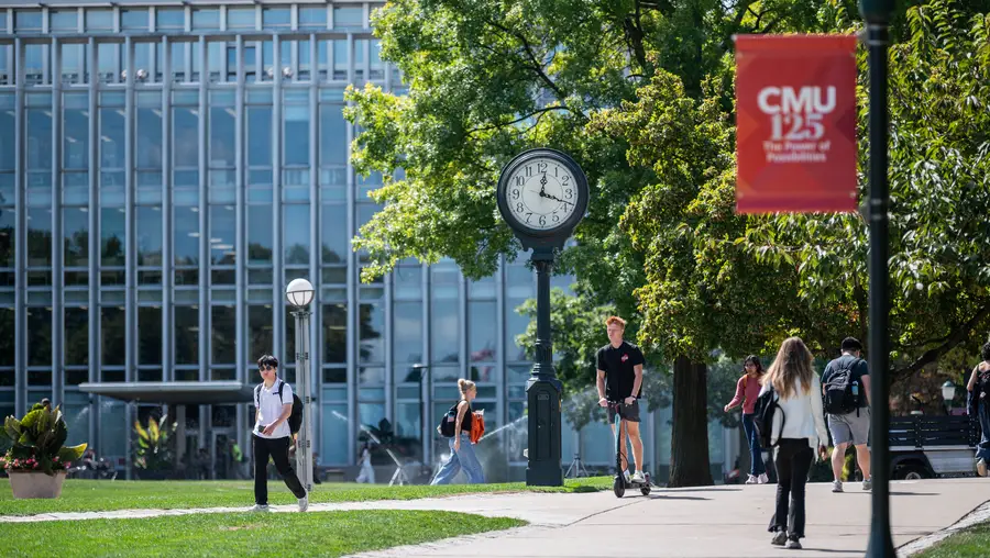 Students walk on CMU campus. 