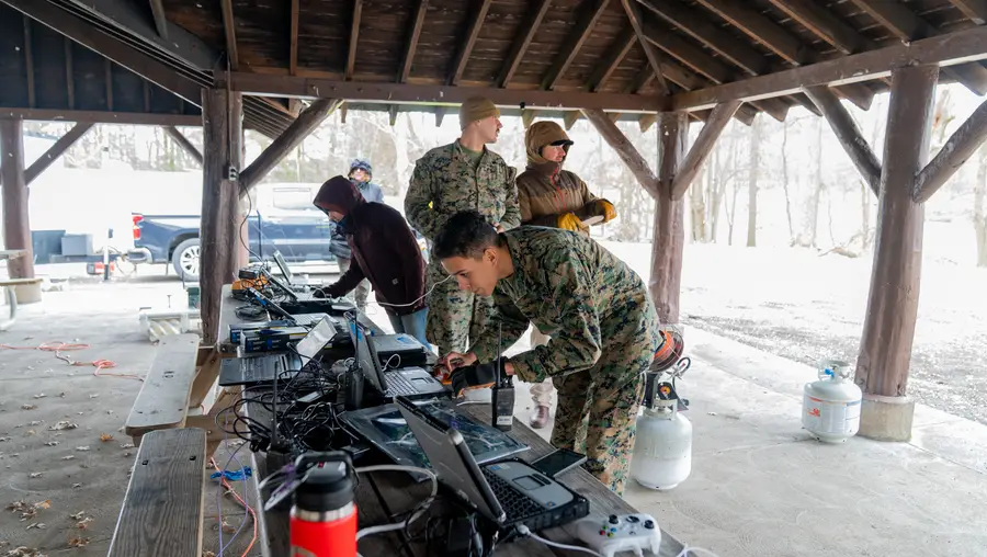 Participants in a multi-event robotics field competition.