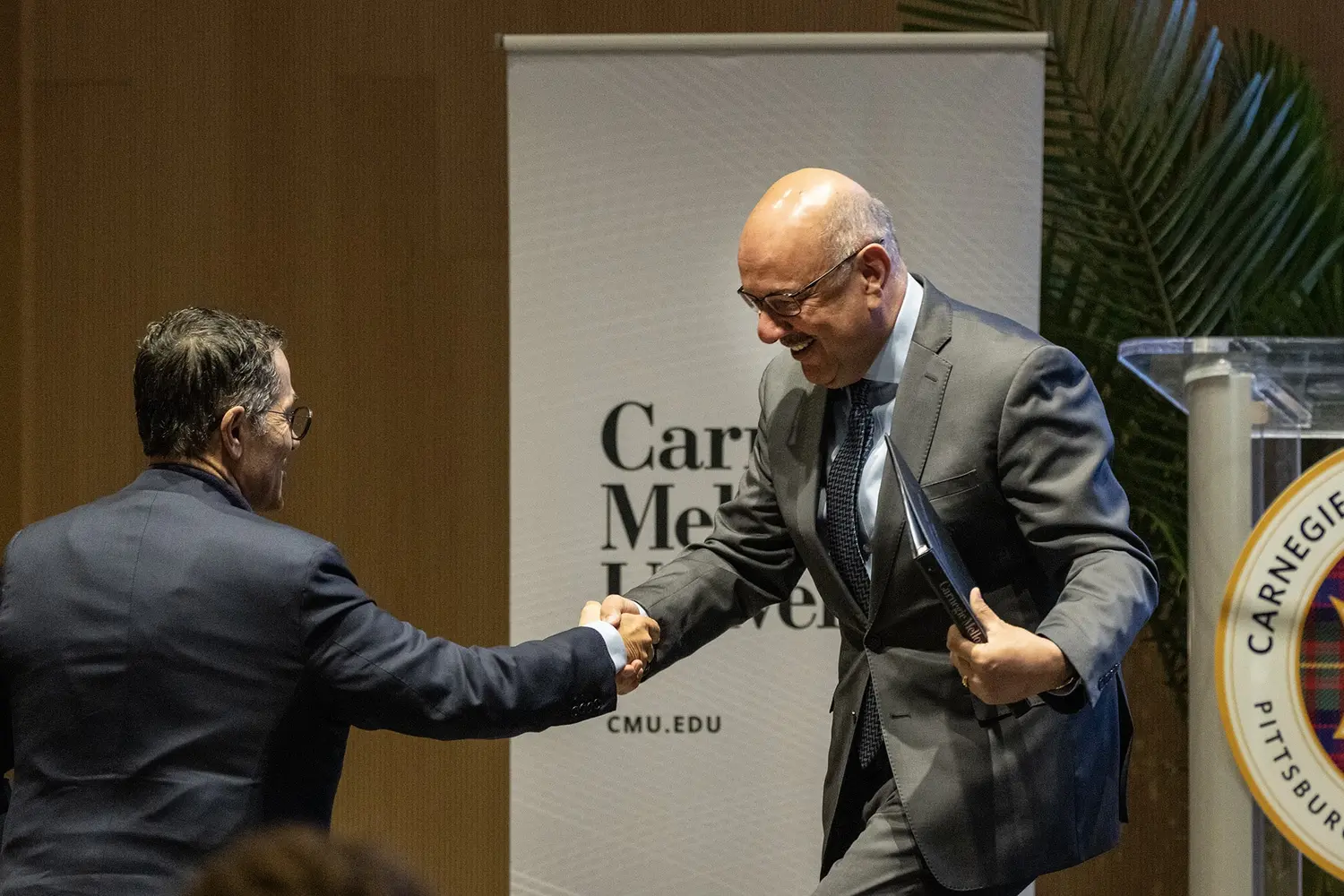 Vali Nasr greeted by Farnam Jahanian