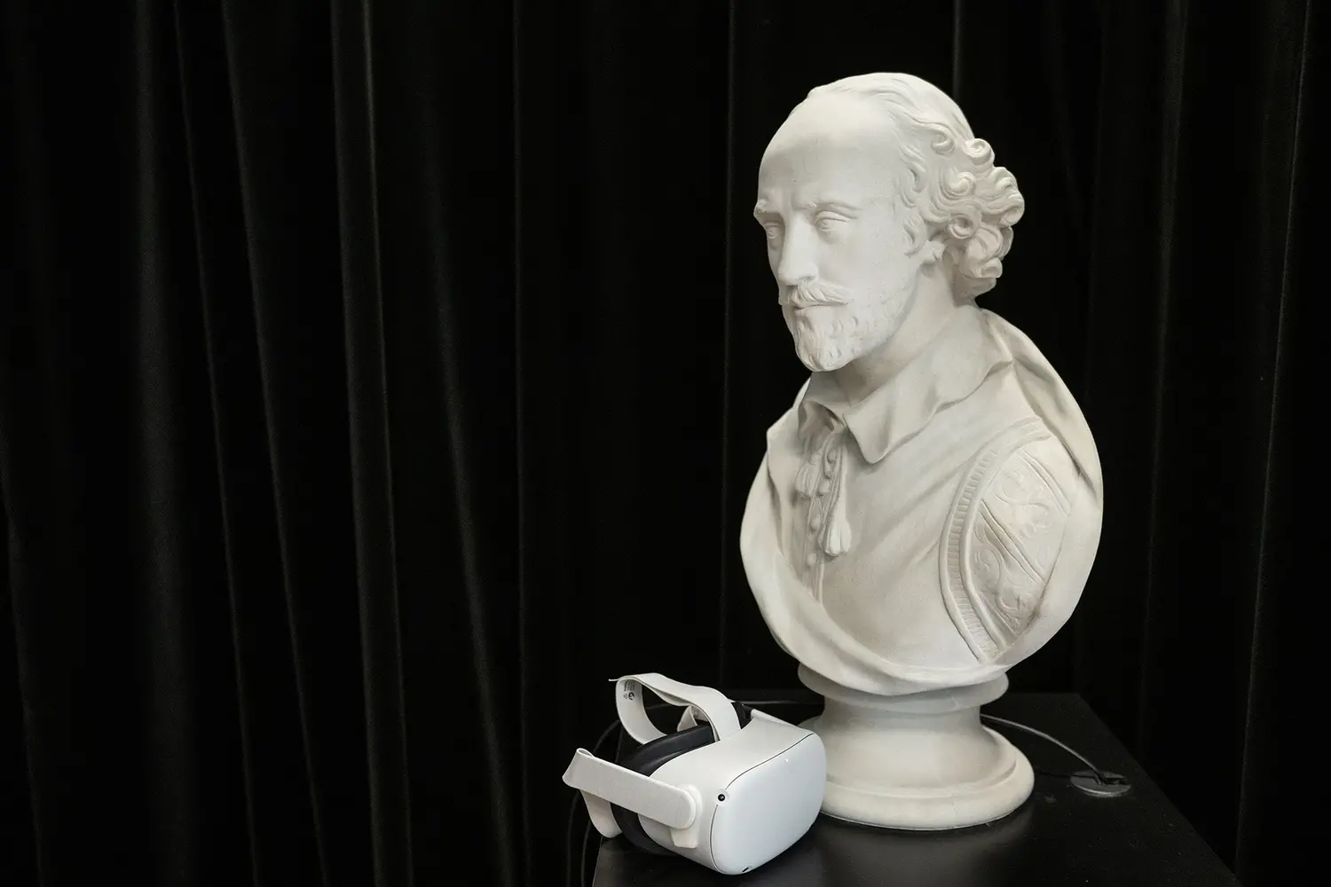 A Shakespeare bust with a VR headset.