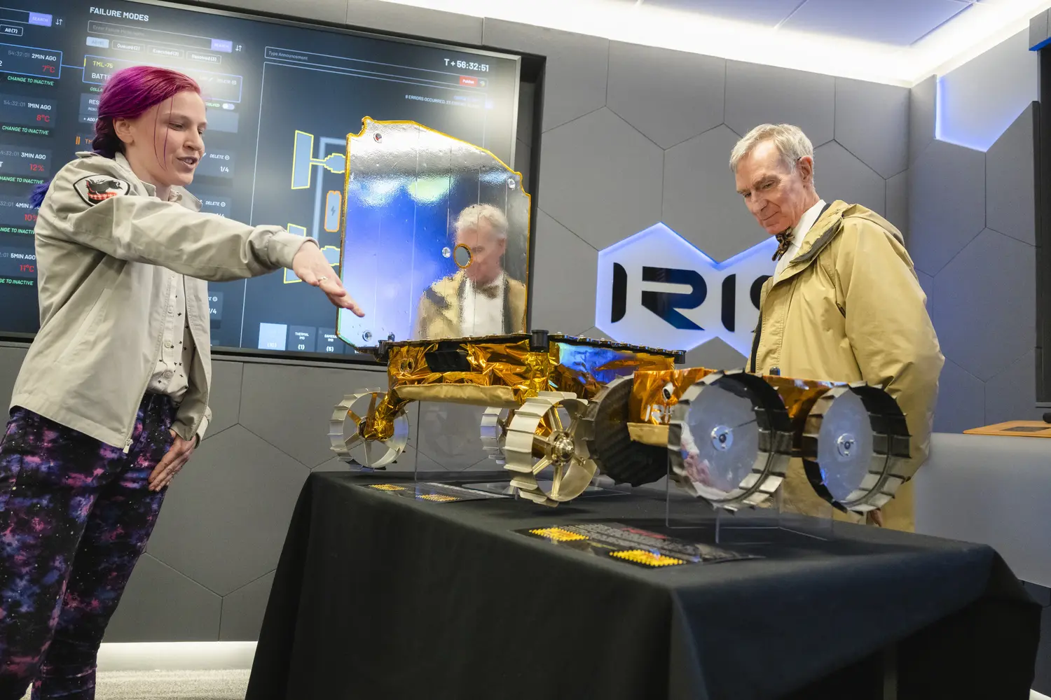 Bill Nye learns about CMU's lunar rover, Iris.
