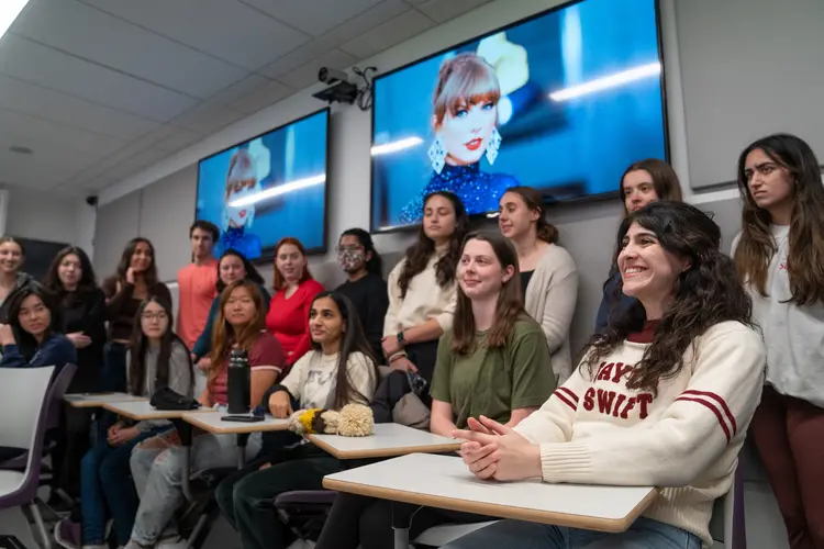 Regina Gamboa (front right) poses with her classmates