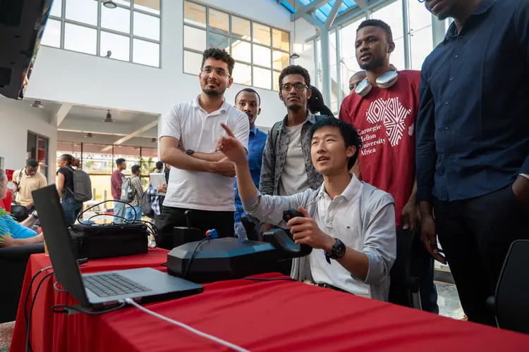 students looking at simulator screen