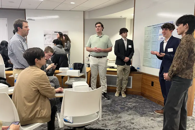 people standing in a classroom
