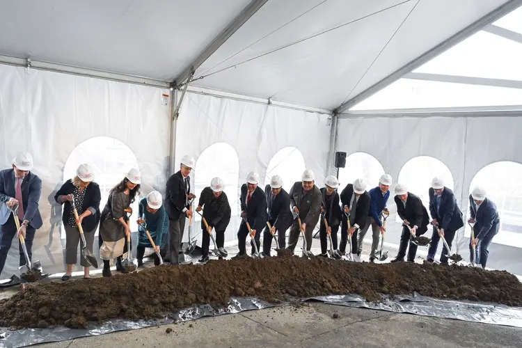 Shovels hit the dirt at the groundbreaking for the Richard King Mellon Hall of Sciences.