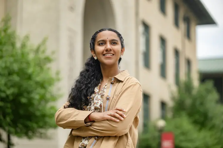 Prasiddha Sudhakar standing outside of Hamburg Hall.