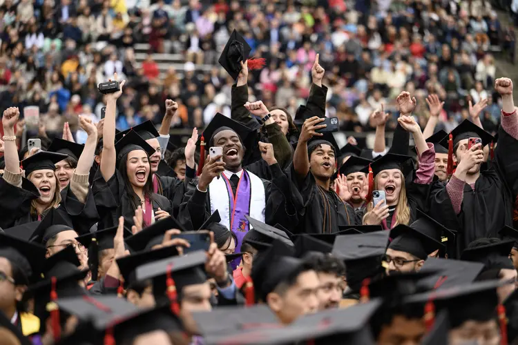 CMU graduates celebrate at Commencement.