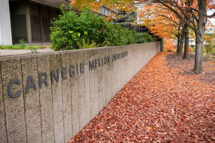 Carnegie Mellon University sign with fall leaves