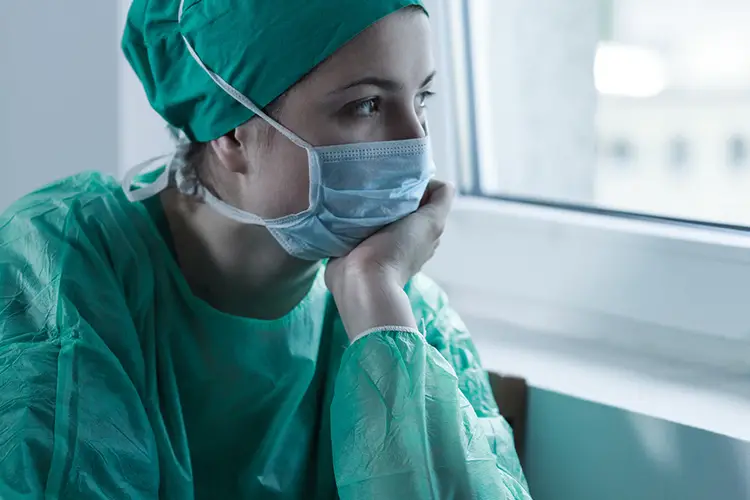Photo of surgeon looking concerned