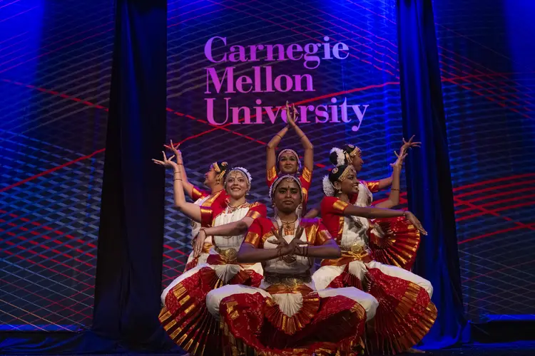 A student organization performs during Community Collage.